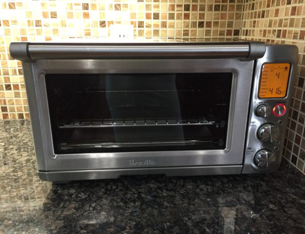 Countertop convection oven.  Cooks succulent chicken and perfect pizza.
